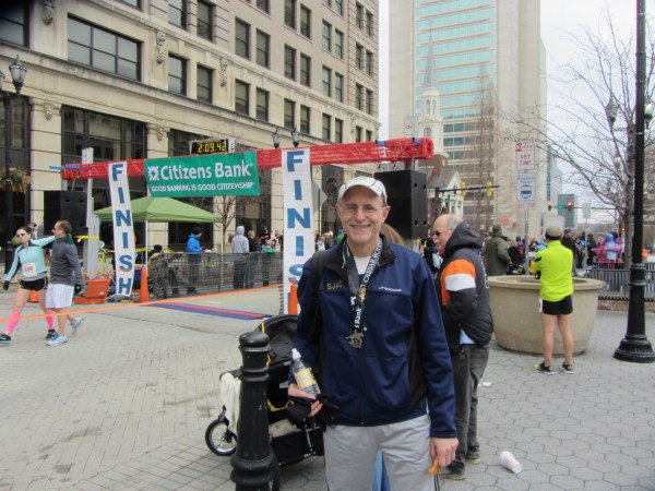 Frank, back in warm, dry clothes again, at the finish line of Caesar Rodney
