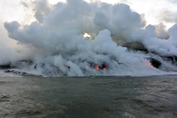 Getting close to the billowing vapor from the lava hitting the ocean water