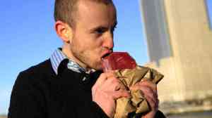 Vlad Averbukh, 29, a follower of the paleo diet, eats raw meat along the Hudson River in New York in 2010. Emmanuel Dunand/AFP/Getty Images