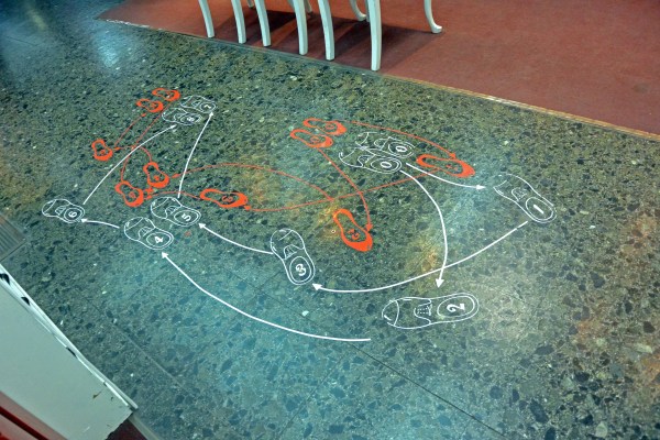 Basic tango steps as documented on the floor of a tango shoe store.